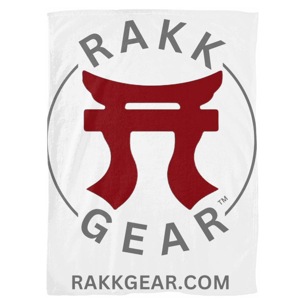 "A soft white fleece blanket featuring the Rakkgear logo for added style and comfort. Perfect for staying cozy at home or on your outdoor adventures."