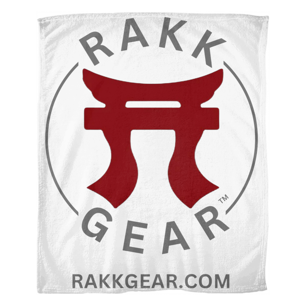 "A soft white fleece blanket featuring the Rakkgear logo for added style and comfort. Perfect for staying cozy at home or on your outdoor adventures."